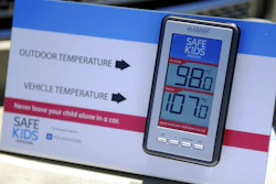 In this July 30, 2015 file photo, St. Mary's and Safe Kids Coalition uses a wireless monitor to record the temperature outside and inside of a closed vehicle at St. Mary's Market Days in Evansville, Ind. A proposed new law that would require carmakers to build alarms for backseats is being pushed by child advocates who say it will prevent kids from dying in hot cars and also streamline the criminal process against caregivers who cause the deaths, cases that can be inconsistent but often heavier-handed against mothers. The latest deaths came in Arizona on triple-digit degree days over the last weekend of July 2017.