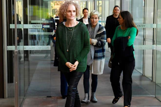 Members of the class action against Johnson & Johnson, Gai Thompson, left, Joanne Maninon, center, and Carina Anderson, right, arrive to address the media outside the Federal Court in Sydney on Tuesday, July 4, 2017. More than 700 Australian women have joined a class-action lawsuit against Johnson & Johnson over the pharmaceutical giant's vaginal mesh implants.