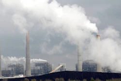 This Wednesday, March 16, 2011, file photo, shows NRG Energy's W.A. Parish Electric Generating Station in Thompsons, Texas. NRG Energy, the money-losing Northeast electric utility, will attempt to raise up to $4 billion through asset sales in a bid to lower debt by $13 billion. The power company, based in Princeton, N.J., said Wednesday, July 12, 2017, that the sale could include the entirety of NRG Yield, its renewable energy business.