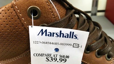 This Tuesday, May 16, 2017, photo shows a price tag on a pair of shoes for sale at a Marshalls store, in Methuen, Mass. On Friday, July 14, 2017, the Commerce Department releases U.S. retail sales data for June.