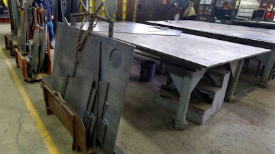 In this photo taken Feb. 12, 2015, cut panels of steel used to make blades to build fans for industrial ventilation systems are stored on the production floor in Harmony, Pa. President Donald Trump pledged during the campaign to help U.S. factory workers by slapping tariffs on foreign steel, but his long-awaited decision on the issue is running behind schedule.