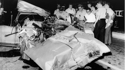 This June 29, 1967, file photo shows the mangled car that actress Jayne Mansfield died in after colliding with a truck, on Route 90 outside of New Orleans. Fifty years after Mansfield car slammed underneath a tractor-trailer, auto safety advocates say hundreds of similar deaths annually could be prevented by guard rails mounted beneath trucks. New York Sen. Charles Schumer has called on federal regulators to require truck underride guards after two cars skidded under a jackknifed milk tanker in northern New York earlier this month.