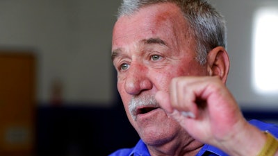 In this Wednesday, June 7, 2017 photo, United Steel Workers local 1999 union president Chuck Jones gestures during an interview in Indianapolis. Jones grabbed headlines in December after he publicly accused then-President-elect Donald Trump of lying about how many jobs he was saving in a deal with furnace and air conditioner maker Carrier Corp.