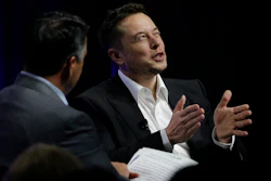 Tesla and SpaceX CEO Elon Musk responds to a question by Nevada Republican Gov. Brian Sandoval during the closing plenary session entitled 'Introducing the New Chairs Initiative - Ahead' on the third day of the National Governors Association's meeting Saturday, July 15, 2017, in Providence, R.I.