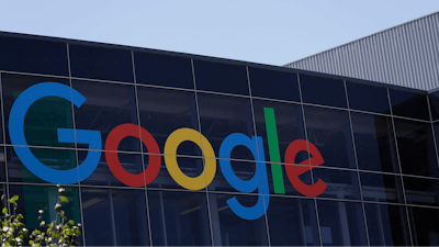 This Tuesday, July 19, 2016, file photo shows the Google logo at the company's headquarters in Mountain View, Calif. Google parent Alphabet is taking a $2.7 billion write-down to cover a large fine EU antitrust enforcers assessed in June 2017. While the search giant can shrug off the cost, uncertainty lingers over its ability to operate freely on the continent going forward.