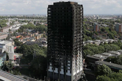 This is a Thursday, June 15, 2017 file photo of The scorched facade of the Grenfell Tower in London after a massive fire raced through the 24-storey high-rise apartment building in west London. British police have described the painstaking work of recovering remains from a burnt-out London high-rise, four weeks after the disaster killed at least 80 people. The Metropolitan Police force says it will take months to identify all the victims, and the agonizing wait has provoked anger and dismay from victim's families.