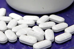 This file photo shows hydrocodone-acetaminophen pills, also known as Vicodin. A government report finds opioid prescription rates have been falling in recent years overall, but rising in more than 1 in 5 U.S. counties.