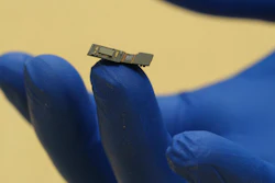 Rice University engineers have built a lab prototype of a flat microscope they are developing as part of DARPA's Neural Engineering System Design project. The microscope will sit on the surface of the brain, where it will detect optical signals from neurons in the cortex. The goal is to provide an alternate path for sight and sound to be delivered directly to the brain.