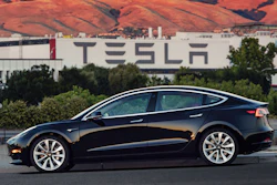 This undated image provided by Tesla Motors shows the Tesla Model 3 sedan. The electric car company’s newest vehicle, the Model 3, which set to go to its first 30 customers Friday, July 28, 2017, is half the cost of previous models. Its $35,000 starting price and 215-mile range could bring hundreds of thousands of customers into Tesla’s fold, taking it from a niche luxury brand to the mainstream.