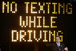 In this May 31, 2013 file photo, New York Gov. Andrew Cuomo speaks during a news conference to announce the increase in penalties for texting while driving in New York. New York state is set to study the use of a device known as the “textalyzer” that would allow police to determine whether a motorist involved in a serious crash was texting while driving. Cuomo announced Wednesday, July 26, 2017, that he would direct the Governor’s Traffic Safety Committee to examine the technology, as well as the privacy and constitutional questions it could raise.
