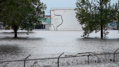 The Arkema Inc. chemical plant is flooded from Tropical Storm Harvey, Wednesday, Aug. 30, 2017, in Crosby, Texas. The plant, about 25 miles (40.23 kilometers) northeast of Houston, lost power and its backup generators amid Harvey’s dayslong deluge, leaving it without refrigeration for chemicals that become volatile as the temperature rises.