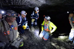 In this Jan. 13, 2015 file photo, Joe Main, third from left, Assistant Secretary of Labor for Mine Safety and Health, and Patricia Silvey, center, Deputy Assistant Secretary for Operations with MSHA, speak with workers at the Gibson North mine, in Princeton, Ind. Deaths in U.S. coal mines this year have surged ahead of last year’s, and federal safety officials say the inexperience of those new to a mine could share the blame. Silvey said eight of the coal miners who died this year had less than a year’s experience at the mine where they worked.