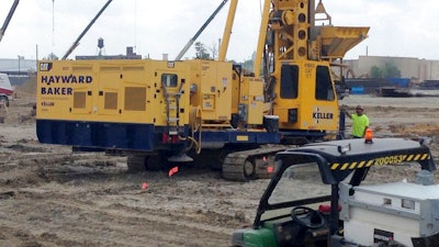 In this July 19, 2017 photo, heavy machinery clearing land at the Interstate 94 Industrial Park in Detroit. The park is former vacant land that the city is marketing to manufacturing and industrial companies. Auto parts supplier Flex-N-Gate is expected to bring 750 jobs to Detroit when it completes its 350,000-square-foot plant at the industrial park.