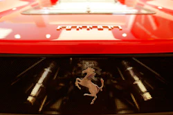 A Ferrari F50 model on display at H.R. Owen Ferrari Atelier in London, Wednesday, Aug. 2, 2017. Ferrari, which spun off last year from its mass-market parent Fiat Chrysler, said Wednesday net profit for the three months through June was 136 million euros ($161 million), from 97 million euros in 2016.