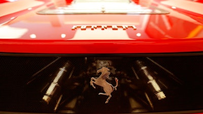 A Ferrari F50 model on display at H.R. Owen Ferrari Atelier in London, Wednesday, Aug. 2, 2017. Ferrari, which spun off last year from its mass-market parent Fiat Chrysler, said Wednesday net profit for the three months through June was 136 million euros ($161 million), from 97 million euros in 2016.