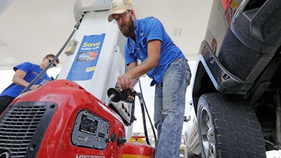 Aaron Berg fills up a gas can and his portable generator in Houston as Hurricane Harvey intensifies in the Gulf of Mexico. Harvey is forecast to be a major hurricane when it makes landfall along the middle Texas coastline.