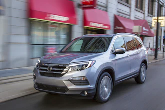This photo provided by Honda shows the 2017 Honda Pilot, which ranks No. 9 in the Made in America Auto Index and is an Edmunds pick for a crossover. The Pilot has 78.5 percent domestic content and is built in Lincoln, Ala.