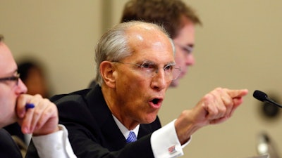 Attorney Dave Domina gestures as he questions Tony Palmer, TransCanada senior vice-president, unseen, who testified before the Nebraska Public Service Commission in Lincoln, Neb., Monday, Aug. 7, 2017. The Nebraska Public Service Commission is holding a five-day public hearing to decide whether to approve TransCanada's Keystone XL pipeline which would transport oil from tar sands deposits in Alberta, Canada, across Montana and South Dakota to Nebraska.