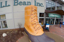 In this March 16, 2016, file photo, shoppers exit the L.L. Bean retail store in Freeport, Maine. L.L. Bean hopes to give the boot to backlogs of its most iconic product. The Maine-based retailer is expanding production to keep up with demand for its leather-and-rubber “duck boot” with a new manufacturing center that’s being unveiled Thursday, Aug. 17, 2017. The company also plans to hire more than 100 additional production workers at two locations in Maine.