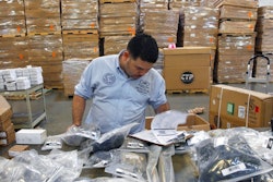 In this Friday, June 2, 2017, file photo, Claudio Montes checks a shipping manifest for U.S. manufactured parts heading to assembly plants in Mexico at Freight Dispatch Service Agency LTD in Pharr, Texas. The freight service ships parts between the U.S. and Mexico that pass through the border freely due to the North American Free Trade Agreement. Of all the trade deals he lambasted on the campaign trail as threats to American workers, President Donald Trump reserved particular scorn for one: NAFTA.
