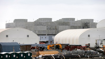 In this Sept. 21, 2016, file photo, a cooling tower for unit two of the V.C. Summer Nuclear Station near Jenkinsville, S.C., is shown during a media tour of the facility. Proponents of nuclear power are pushing to revive a failed project to build two reactors in South Carolina, arguing that the demise of the $14 billion venture could signal doom for an industry that supplies one-fifth of the nation’s electricity. The July 31 suspension of the partly-completed V.C. Summer project near Columbia, S.C., leaves two nuclear reactors under construction in Georgia as the only ones being built in the U.S.