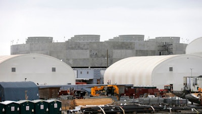 In this Sept. 21, 2016, file photo, a cooling tower for unit two of the V.C. Summer Nuclear Station near Jenkinsville, S.C., is shown during a media tour of the facility. Proponents of nuclear power are pushing to revive a failed project to build two reactors in South Carolina, arguing that the demise of the $14 billion venture could signal doom for an industry that supplies one-fifth of the nation’s electricity. The July 31 suspension of the partly-completed V.C. Summer project near Columbia, S.C., leaves two nuclear reactors under construction in Georgia as the only ones being built in the U.S.