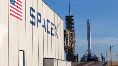 In this photo provided by NASA, a SpaceX Falcon 9 rocket and Dragon spacecraft await liftoff from NASA Kennedy Space Center’s Launch Complex 39A in Cape Canaveral, Fla., on Monday, Aug. 14, 2017. SpaceX is about to launch a few tons of research to the International Space Station — plus ice cream.