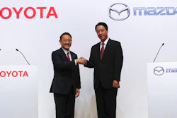 Toyota Motor Corp. President Akio Toyoda, left, and Mazda Motor Corp. President Masamichi Kogai, pose for media prior to a press conference in Tokyo Friday, Aug. 4, 2017. Japanese automakers Toyota Motor Corp. and Mazda Motor Corp. said Friday they plan to spend $1.6 billion to set up a joint-venture auto manufacturing plant in the U.S. — a move that will create up to 4,000 jobs.