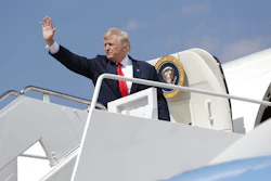 President Donald Trump waves as he boards Air Force One at Andrews Air Force Base, Md., Friday, Aug. 4, 2017, en route to New Jersey to begin his summer vacation at his Bedminster golf club.