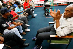 Actor and human rights activist Danny Glover, applauds with UAW members and Nissan employees at the UAW Canton, Miss., headquarters during a workers' rally, near the Nissan vehicle assembly plant, Tuesday, Aug. 1, 2017. Glover participated in the small rally to maintain workers' morale, while UAW workers set up an informational line outside employee entrances at the Nissan plant. The UAW has a vote scheduled Aug. 3-4, on whether it should represent the 3,700 full time company workers.