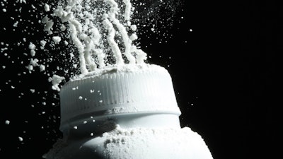 In this April 19, 2010, file photo, Johnson's baby powder is squeezed from its container. On Monday, Aug. 21, 2017, a Los Angeles County Superior Court spokeswoman confirmed that a jury has ordered Johnson & Johnson to pay $417 million in a case to a woman who claimed in a lawsuit that the talc in the company's iconic baby powder causes ovarian cancer when applied regularly for feminine hygiene.