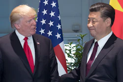 In this Saturday, July 8, 2017, file photo, U.S. President Donald Trump, left, and Chinese President Xi Jinping arrive for a meeting on the sidelines of the G-20 Summit in Hamburg, Germany.