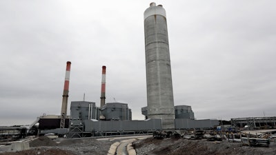 This Jan. 25, 2017 file photo shows the Gallatin Fossil Plant in Gallatin, Tenn. A federal judge on Friday, AUG. 4, 2017 ordered the nation’s largest public utility to dig up its coal ash at Tennessee Valley Authority’s Gallatin Fossil Plant and move it to a lined waste site where it doesn’t risk further polluting the Cumberland River.
