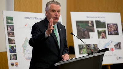 Virginia Gov. Terry McAuliffe gestures during a news conference at the Capitol in Richmond, Va., Thursday, Dec. 15, 2016. McAuliffe announced a proposed $50 million settlement to resolve claims stemming from the release of mercury from the former E.I. du Pont de Nemours and Company (DuPont) facility in Waynesboro, Virginia.