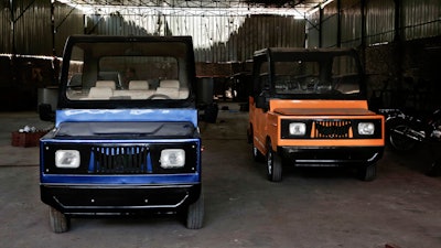 This Tuesday, Aug. 1, 2017 photo, shows new locally made Egyptian minicars parked inside a garage, in the village of Kerdasa, not far from the Giza Pyramids, greater Cairo, Egypt. Entrepreneur Ahmed Saeed el-Feki’s golf-cart looking minicar is different in design and mechanical efficiency from the Chinese Tuk Tuk, a three-wheeled motorized vehicle used as a taxi, which is popular in Egypt.