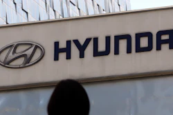 In this April 26, 2017 file photo, the logo of Hyundai Motor Co. is displayed at the automaker's showroom in Seoul, South Korea. Hyundai Motor Co. said Wednesday, Aug.30, 2017, that it resumed production at its plants in China where the automaker has been working to resolve a dispute with a parts supplier that led to a complete production halt.