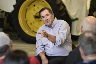 Indiana Sen. Joe Donnelly answers questions from local tomato farmers during a Farm Bill listening session at Carey Farms, Jonesboro, Ind., on Monday, Aug. 28, 2017.
