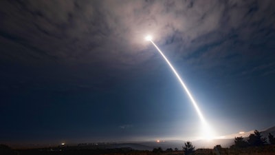 In this image taken with a slow shutter speed and provided by Vandenberg Air Force Base, an unarmed Minuteman 3 missile launches from Vandenberg Air Force Base, Calif., Wednesday, Aug. 2, 2107. The U.S. Air Force has successfully launched the unarmed intercontinental ballistic missile, the fourth such test this year.