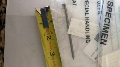 This photo taken Aug. 15, 2017 by Doug Bergeson shows the nail that Bergeson accidentally shot into his chest in June while he was working on a house he was building near Peshtigo, Wis.