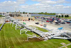 This photo provided by the Wayne Township Fire Department shows a network of large pipes and support structures that collapsed at a Rolls-Royce aircraft-engine assembly plant in Indianapolis, Friday, Aug. 4, 2017. A Rolls Royce spokesman said there were no injuries.