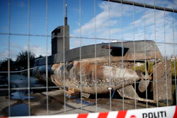 In this Tuesday, Aug. 22, 2017 photo, a private submarine sits on a pier in Copenhagen harbor, Denmark. Danish police say a DNA test from a headless torso found in the Baltic Sea matches with missing Swedish journalist Kim Wall, who is believed to have died on the private submarine.