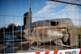 In this Tuesday, Aug. 22, 2017 photo, a private submarine sits on a pier in Copenhagen harbor, Denmark. Danish police say a DNA test from a headless torso found in the Baltic Sea matches with missing Swedish journalist Kim Wall, who is believed to have died on the private submarine.