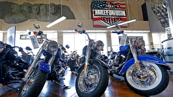 This Tuesday, April 25, 2017, photo shows Harley-Davidson motorcycles on display in the showroom at a dealership in Miami. On Wednesday, Sept. 27, 2017, the Commerce Department releases its August report on durable goods.