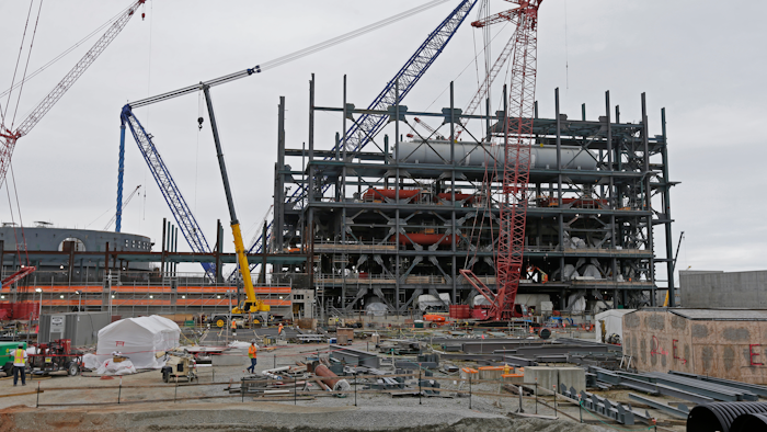 In this Sept. 21, 2016, file photo, V.C. Summer Nuclear Station's unit two's turbine is under construction near Jenkinsville, S.C., during a media tour of the facility. Solicitor General Bob Cook, one of South Carolina’s top prosecutors, said a state law used by utilities to raise customers’ rates to fund the now-defunct nuclear project is “constitutionally suspect.”