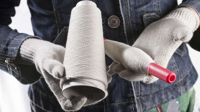 This is fabric made from VTT's recycled fiber feels half way between cotton and viscose.