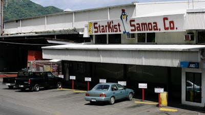 This Oct 3, 2009 file photo shows the Starkist Samoa Co. tuna cannery in Pago Pago, American Samoa. The world's largest supplier of canned tuna will pay a $6.3-million penalty for wastewater treatment violations in American Samoa, where StarKist Co. is a major employer. The Pittsburgh-based company will also take steps to reduce environmental harm to the territory, stemming from a 2014 pipeline break at the American Samoa plant that spilled unpermitted wastewater into the inner Pago Pago Harbor.