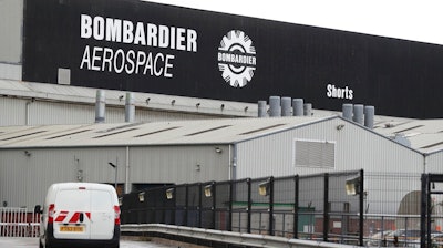 This is a Sept. 13, 2017 file photo of the Bombardier Aerospace plant in Belfast, Northern Ireland. U.K. Prime Minister Theresa May is 'bitterly disappointed' by the U.S. government's decision to slap duties of nearly 220 percent on Canada's Bombardier C series aircraft. May took to Twitter on Wednesday Sept. 27, 2017 to say Britain will continue to work with the company to try to protect jobs, including some 4,000 in Northern Ireland. May has a key alliance with the Northern Ireland-based Democratic Unionist Party.