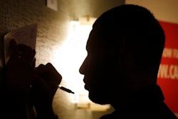 In this Tuesday, July 19, 2016, file photo, a man fills out a job application at a job fair, in Miami Lakes, Fla. On Thursday, Sept. 21, 2017, the Labor Department reports on the number of people who applied for unemployment benefits the week before.
