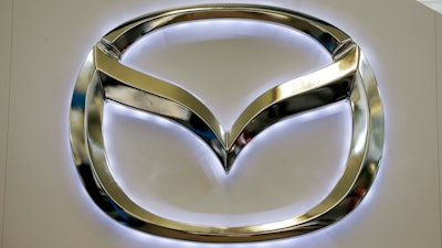 Mazda is recalling more than 60,000 midsize cars in the U.S. and Canada because a wiring problem can knock out power-assisted steering and the passenger air bag.