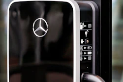 In this file photo dated Monday, Sept. 11, 2017, a loading station for Mercedes electric cars at the IAA Car Show in Frankfurt, Germany. Germany's Daimler AG announced Thursday Sept. 21, 2017, says its Mercedes-Benz luxury car division will invest US dlrs 1 billion to set up electric vehicle production at its Tuscaloosa, Alabama plant, also building a new battery plant, adding 600 new jobs in the region.